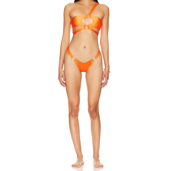 Orange bikini set styled with rings and cutout designed